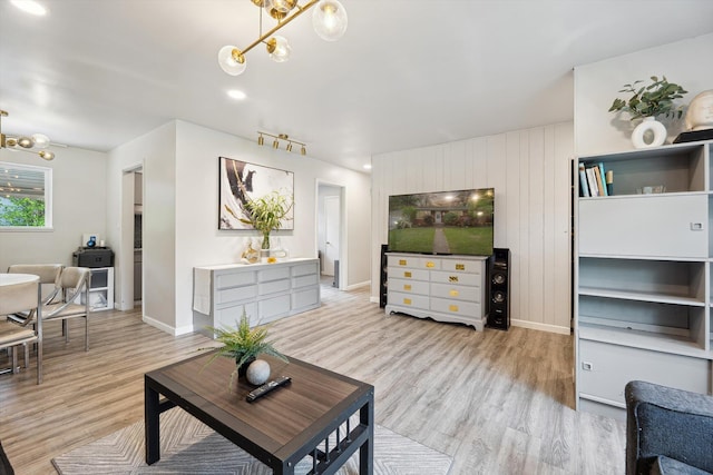 2419 Faye Dr, Ann Arbor, MI 48103 - living area featuring a chandelier, light wood-type flooring, baseboards, and recessed lighting