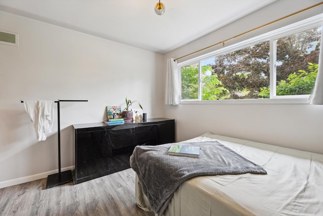 2419 Faye Dr, Ann Arbor, MI 48103 - bedroom featuring wood finished floors and baseboards