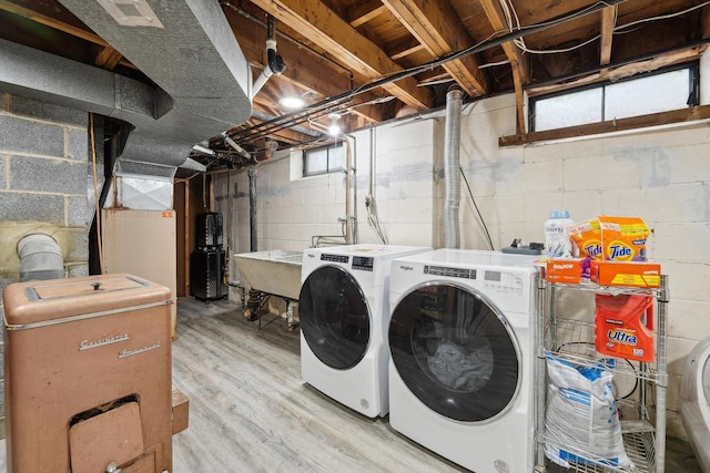2419 Faye Dr, Ann Arbor, MI 48103 - laundry area with separate washer and dryer and light wood-style flooring