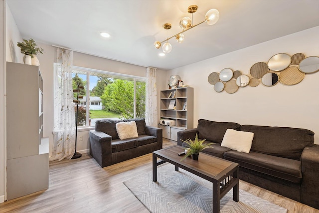 2419 Faye Dr, Ann Arbor, MI 48103 - living area with light wood-style floors, baseboards, and recessed lighting