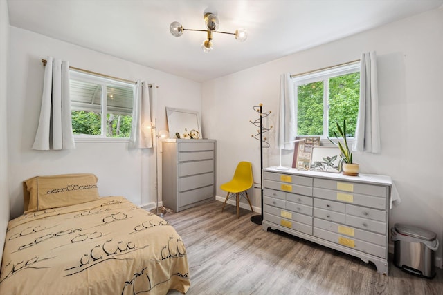 2419 Faye Dr, Ann Arbor, MI 48103 - bedroom with wood finished floors and baseboards