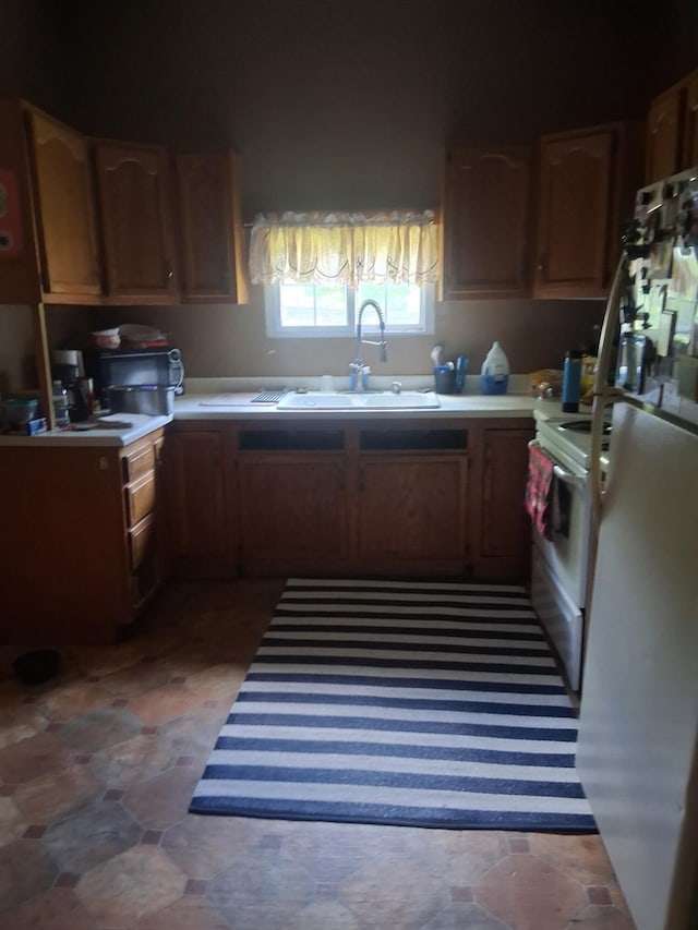 1175 Hammond Rd, Hastings, MI 49058 - kitchen with light countertops and white electric range oven
