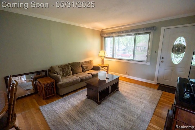 29974 Tamarack Dr, Flat Rock, MI 48134 - living area with wood finished floors, crown molding, and baseboards