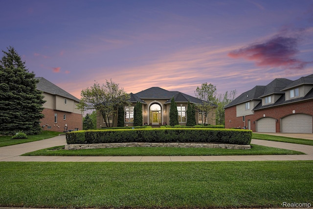 699 Majestic, Rochester Hills, MI 48306 - view of front of home featuring a front lawn and a garage