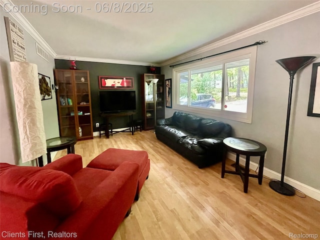 5844 Crandall Rd, Howell, MI 48855 - living room featuring wood finished floors, crown molding, and baseboards