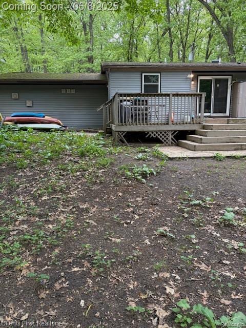 5844 Crandall Rd, Howell, MI 48855 - view of front of home with a wooden deck