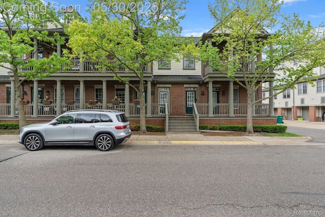239 Jotham Ave, Auburn Hills, MI 48326 - view of property featuring brick siding and covered porch
