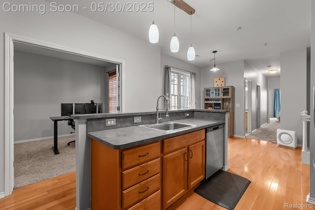 239 Jotham Ave, Auburn Hills, MI 48326 - kitchen featuring a sink, dishwasher, dark countertops, brown cabinets, and an island with sink