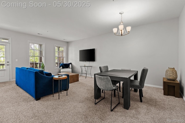 239 Jotham Ave, Auburn Hills, MI 48326 - carpeted dining space with a chandelier, plenty of natural light, and baseboards