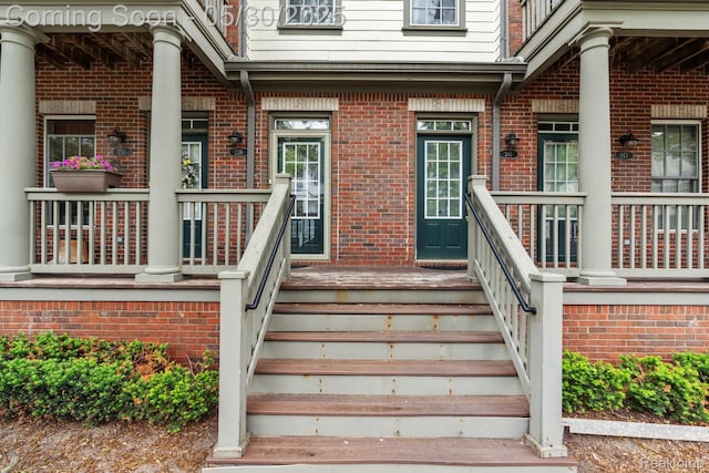 239 Jotham Ave, Auburn Hills, MI 48326 - property entrance featuring brick siding and a porch