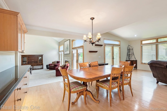 5299 Pond Bluff Dr, West Bloomfield, MI 48323 - dining room featuring a chandelier, light wood-style flooring, lofted ceiling, and ornamental molding