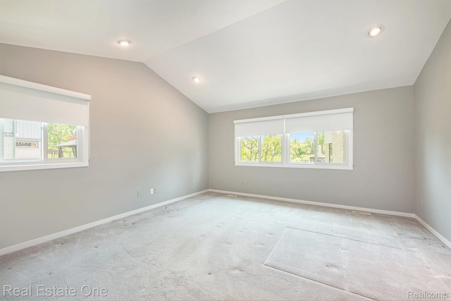 5299 Pond Bluff Dr, West Bloomfield, MI 48323 - empty room with carpet floors, plenty of natural light, lofted ceiling, baseboards, and recessed lighting