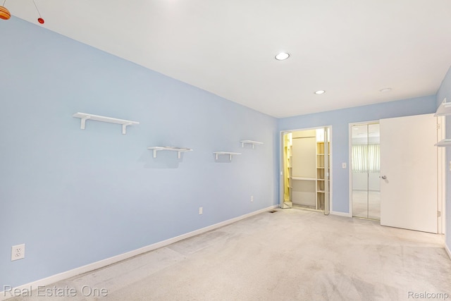 5299 Pond Bluff Dr, West Bloomfield, MI 48323 - unfurnished bedroom with baseboards, carpet flooring, and recessed lighting