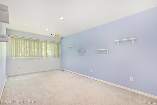 5299 Pond Bluff Dr, West Bloomfield, MI 48323 - carpeted spare room with baseboards and recessed lighting