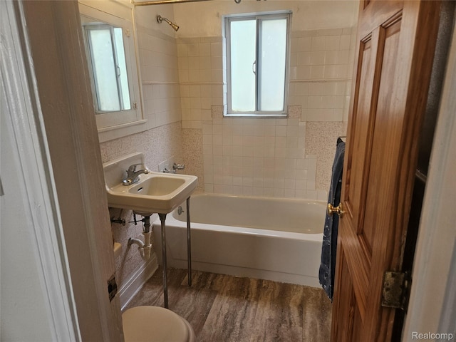 4634 8th St, Ecorse, MI 48229 - full bath featuring wood finished floors, bathtub / shower combination, toilet, and a sink