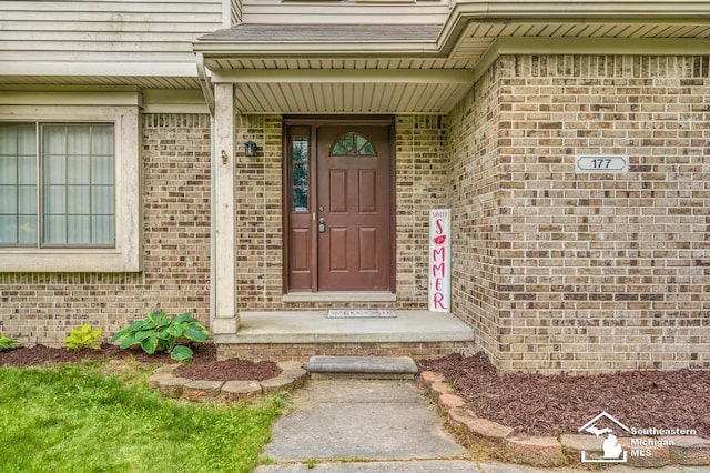 177 W Willis Rd, Saline, MI 48176 - doorway to property featuring brick siding