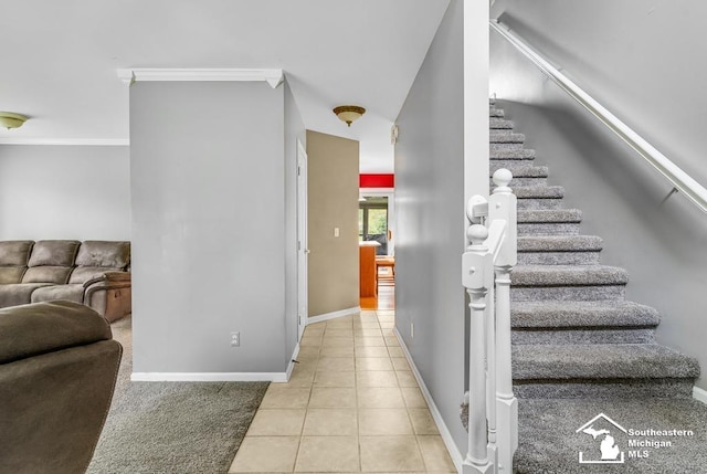 177 W Willis Rd, Saline, MI 48176 - stairs with tile patterned floors, baseboards, and crown molding