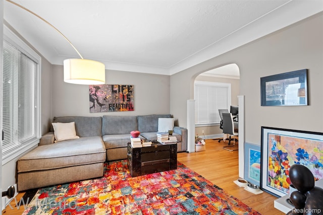 634 E Lewiston Ave, Ferndale, MI 48220 - living area with arched walkways and wood finished floors