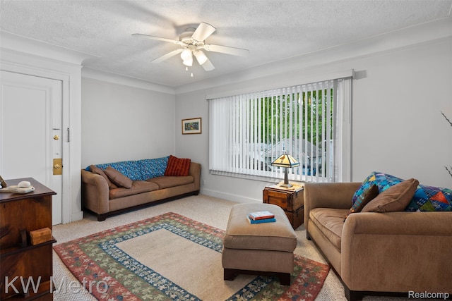 634 E Lewiston Ave, Ferndale, MI 48220 - living area featuring a ceiling fan, carpet flooring, and a textured ceiling