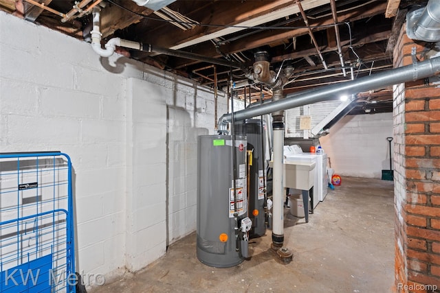634 E Lewiston Ave, Ferndale, MI 48220 - unfinished basement featuring water heater and independent washer and dryer