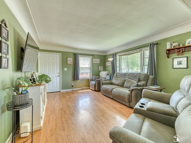 424 W 4th St, Monroe, MI 48161 - living area with light wood finished floors and baseboards