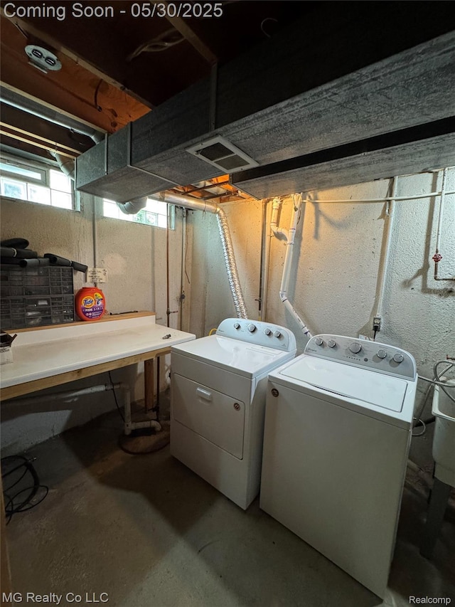 271 Inlet Ct, Novi, MI 48390 - washroom with washer and dryer