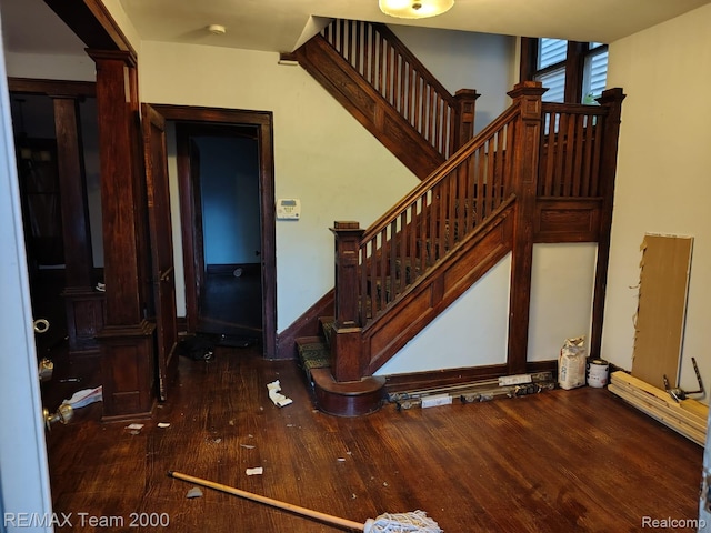 1601 Lawndale St, Highland Park, MI 48209 - stairway with wood finished floors and decorative columns
