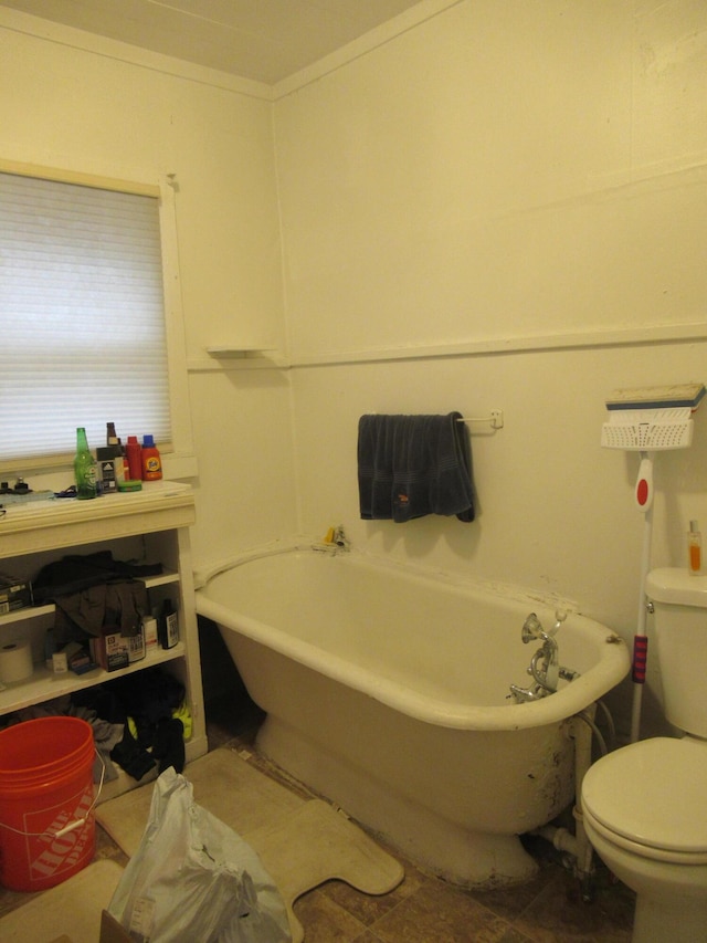 710 Cattawba Ave, Muskegon, MI 49442 - bathroom with a freestanding tub and toilet