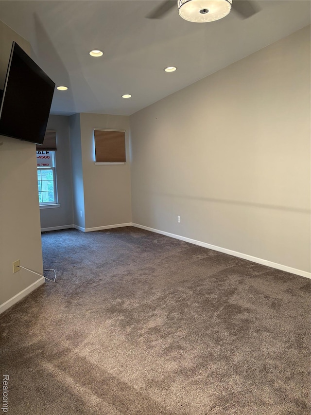56645 Long Island Dr, Shelby Twp, MI 48316 - unfurnished room with dark carpet, ceiling fan, baseboards, and recessed lighting