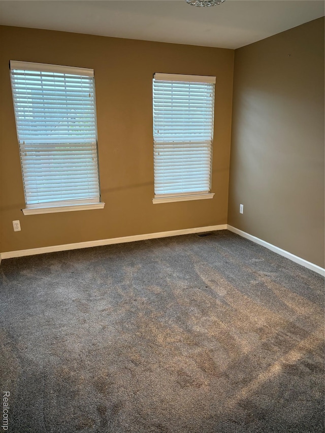 56645 Long Island Dr, Shelby Twp, MI 48316 - unfurnished room featuring baseboards and carpet