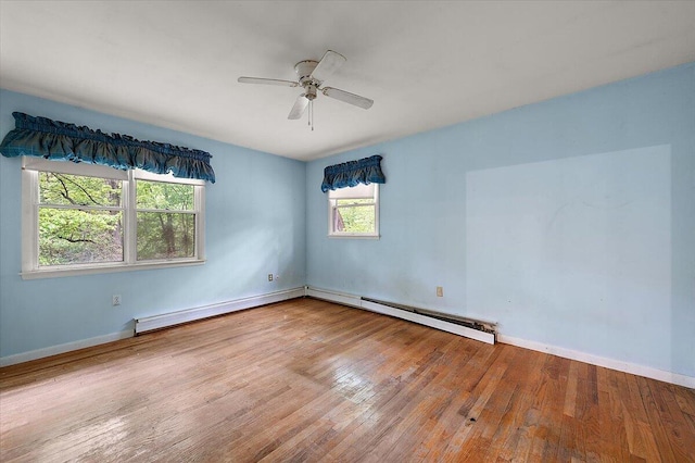 2100 Delhi W, Ann Arbor, MI 48103 - empty room with wood finished floors, ceiling fan, and baseboards
