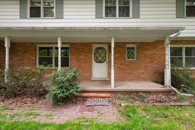 2100 Delhi W, Ann Arbor, MI 48103 - entrance to property with a porch and brick siding