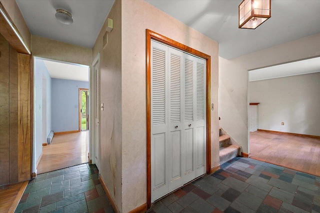 2100 Delhi W, Ann Arbor, MI 48103 - hallway featuring stairway, baseboards, and stone tile flooring