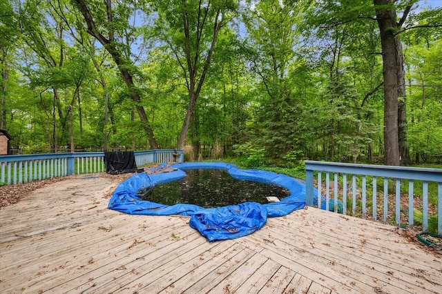 2100 Delhi W, Ann Arbor, MI 48103 - wooden deck with a covered pool