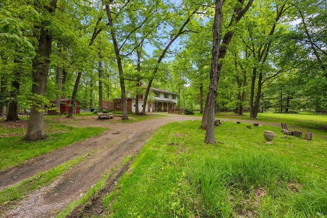 2100 Delhi W, Ann Arbor, MI 48103 - view of front of property with dirt driveway and a front lawn