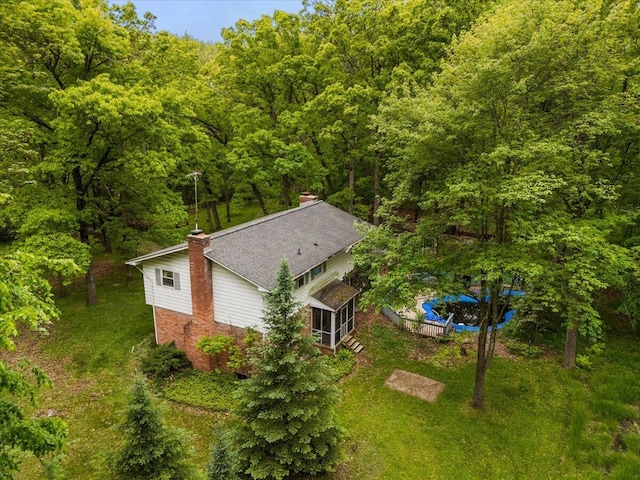 2100 Delhi W, Ann Arbor, MI 48103 - aerial view of property and surrounding area with a forest and a pool