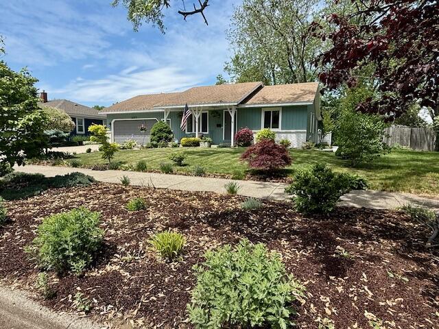 307 W 30th St, Holland, MI 49423 - single story home with an attached garage