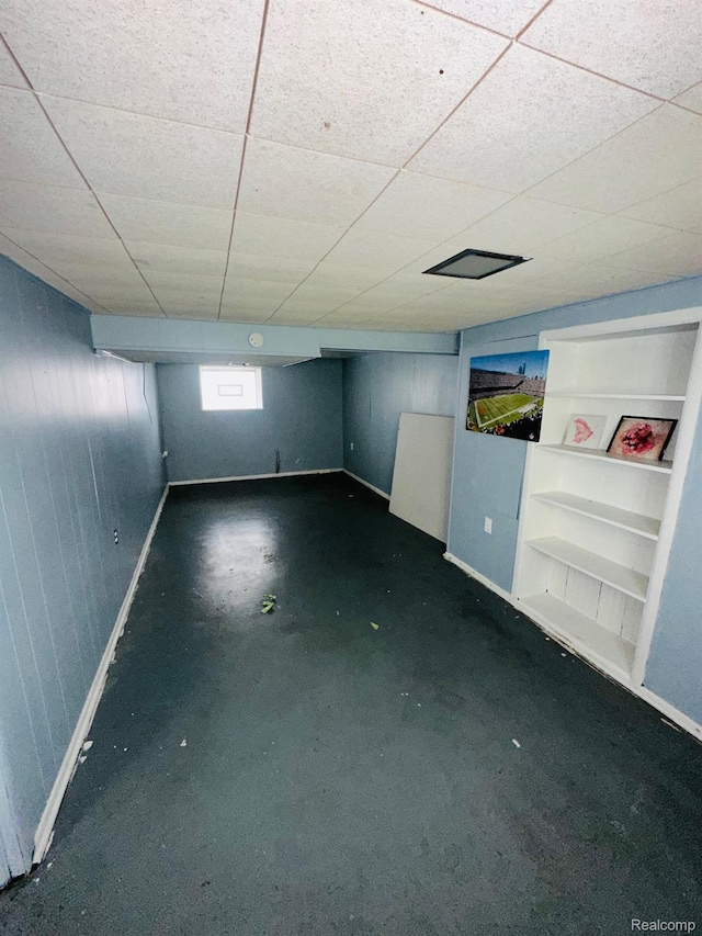 47 W Rockwood St, Ecorse, MI 48229 - below grade area with baseboards and a paneled ceiling