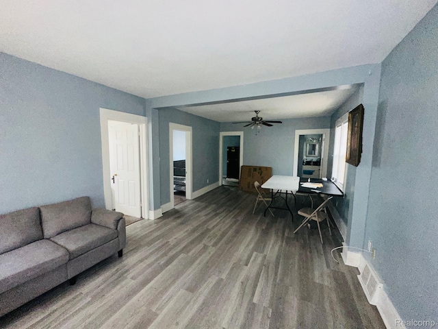 47 W Rockwood St, Ecorse, MI 48229 - living area featuring wood finished floors, baseboards, and ceiling fan
