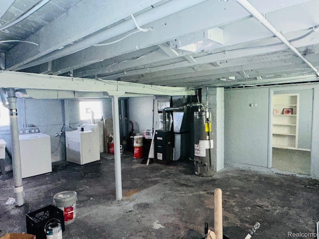 47 W Rockwood St, Ecorse, MI 48229 - below grade area with water heater, separate washer and dryer, and heating unit