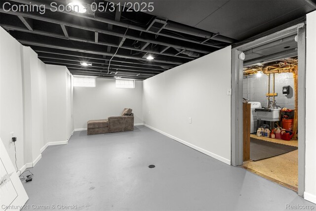 17621 Wood St, Melvindale, MI 48122 - below grade area with baseboards and a sink