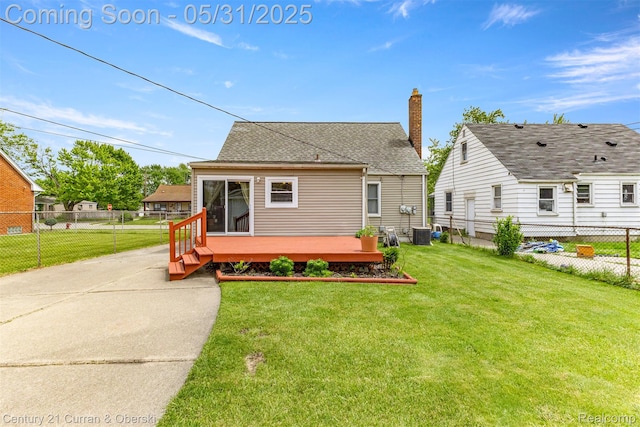 17621 Wood St, Melvindale, MI 48122 - rear view of house featuring a wooden deck, central air condition unit, a chimney, and roof with shingles