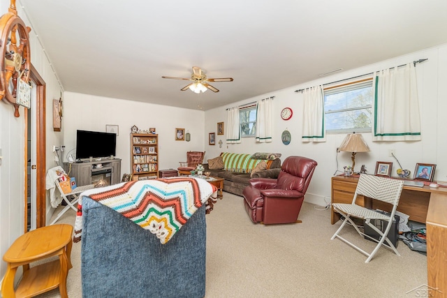 2615 Yosemite St, Saginaw, MI 48603 - living room featuring a ceiling fan and carpet flooring