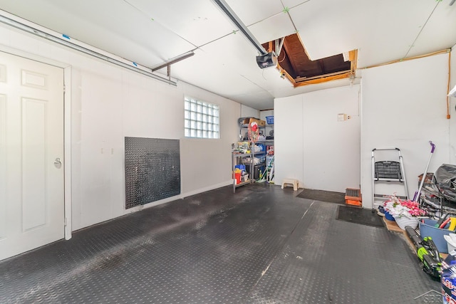 2615 Yosemite St, Saginaw, MI 48603 - garage featuring a garage door opener
