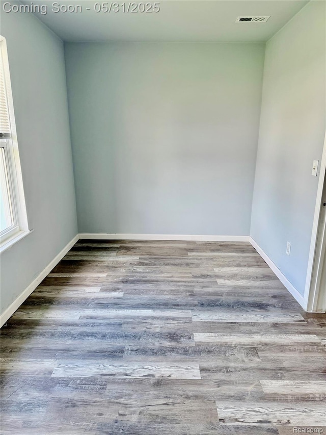 3648 Mack Ave, Hamtramck, MI 48207 - empty room featuring wood finished floors and baseboards