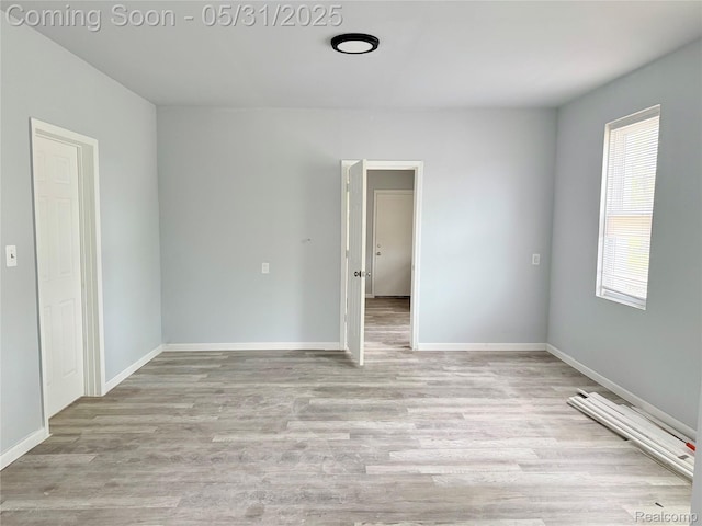 3648 Mack Ave, Hamtramck, MI 48207 - unfurnished room with wood finished floors and baseboards