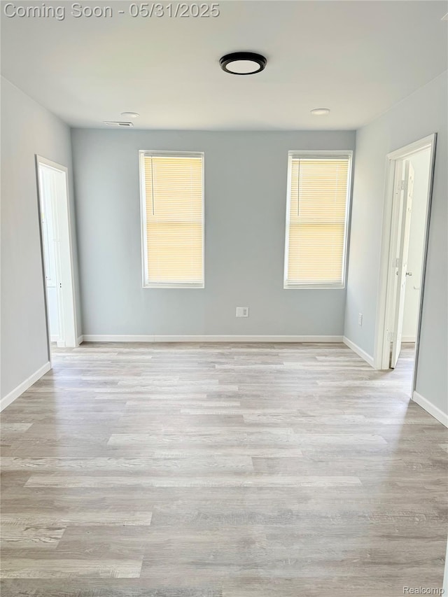 3648 Mack Ave, Hamtramck, MI 48207 - empty room featuring wood finished floors and baseboards