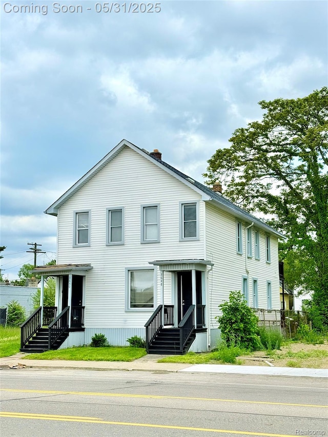 3648 Mack Ave, Hamtramck, MI 48207 - view of front of property with a chimney