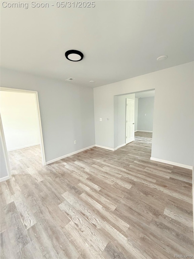 3648 Mack Ave, Hamtramck, MI 48207 - unfurnished room featuring light wood finished floors and baseboards