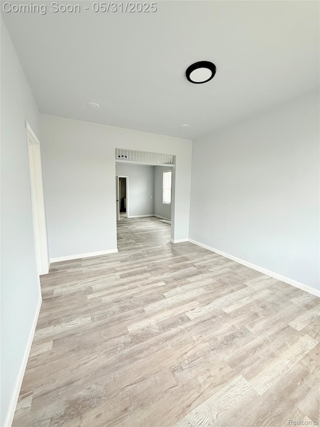 3648 Mack Ave, Hamtramck, MI 48207 - empty room with light wood finished floors and baseboards